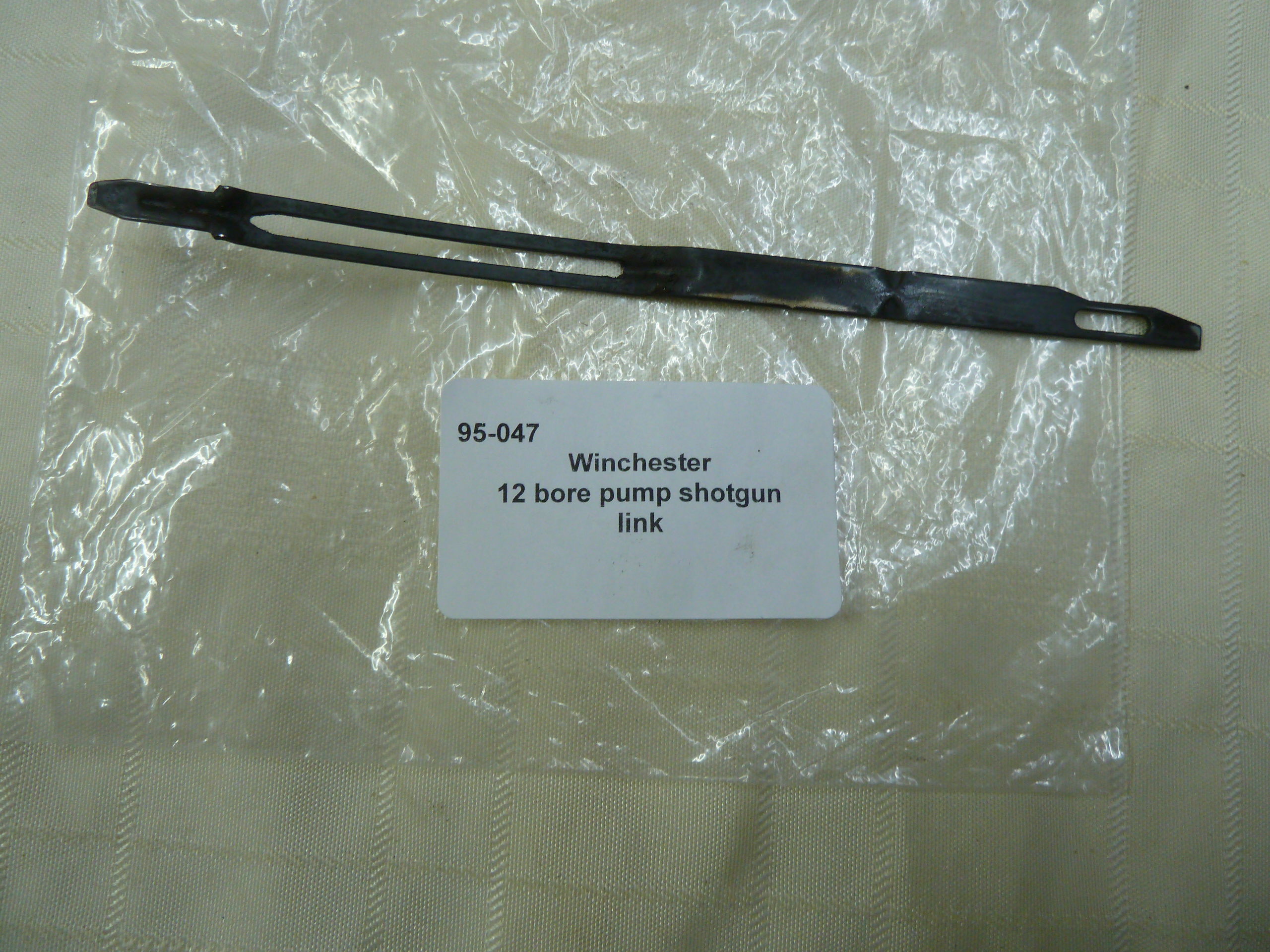 Winchester pump action shotgun link