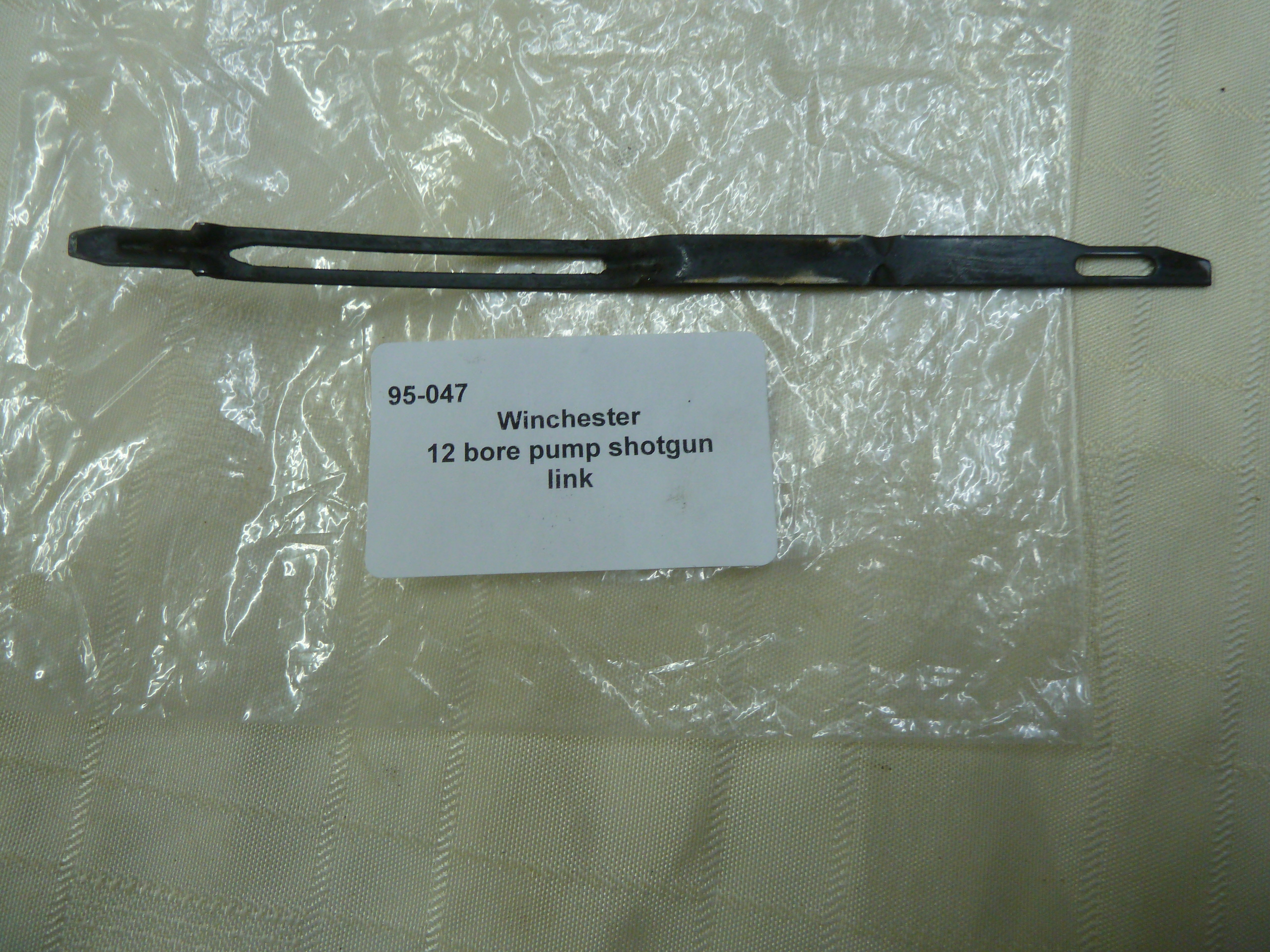 Winchester pump action shotgun link