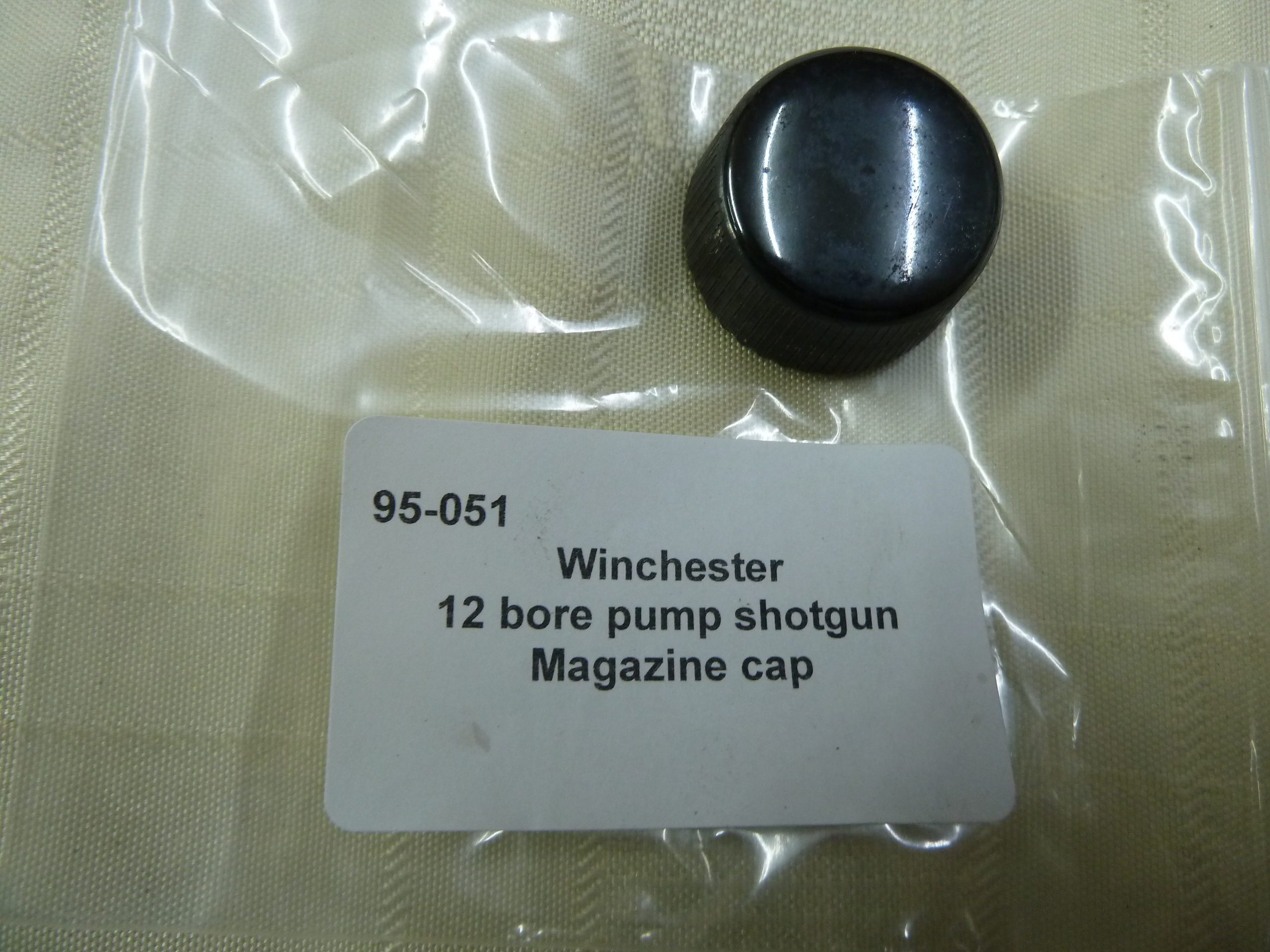 Winchester pump action shotgun magazine cap