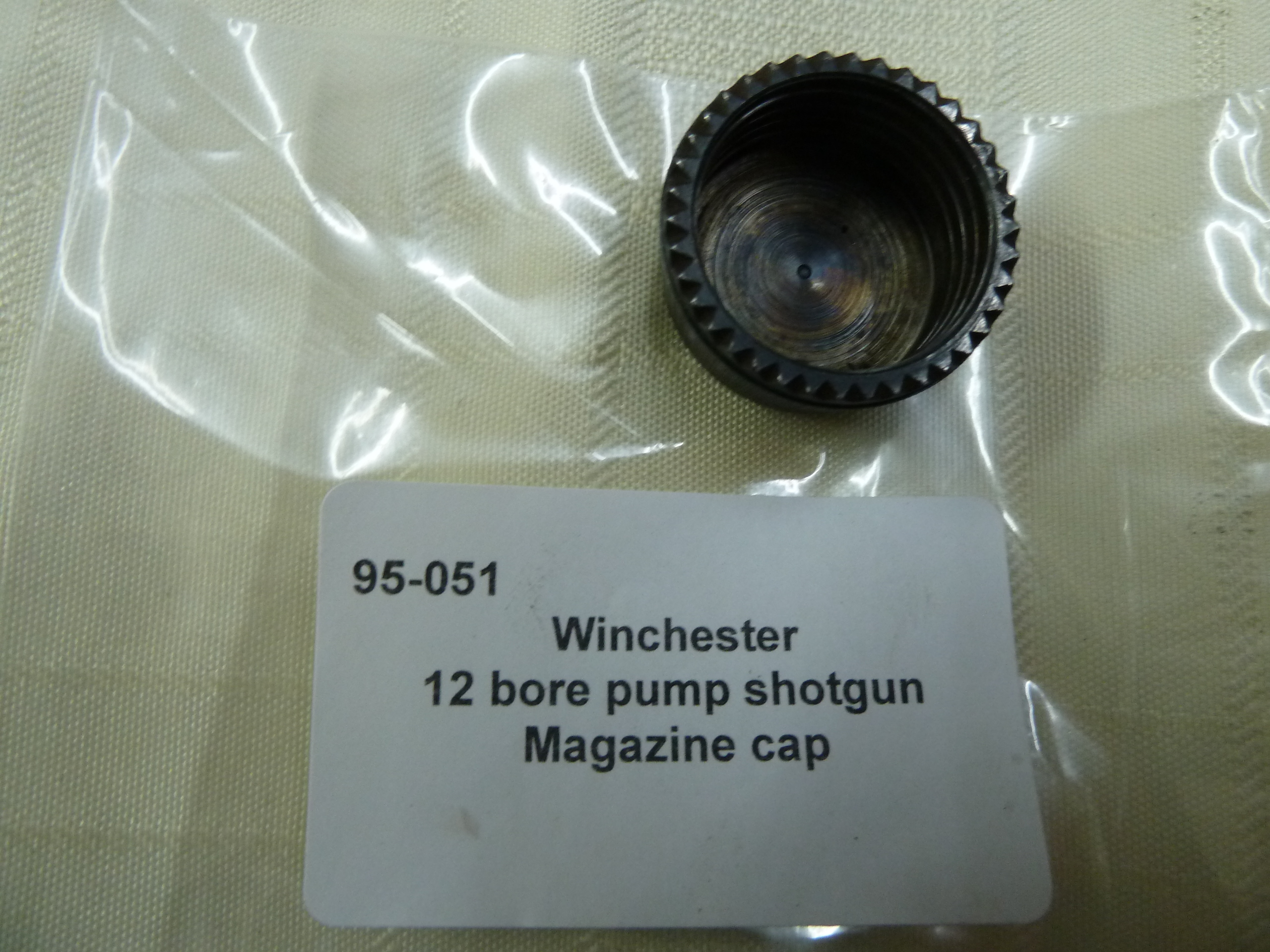 Winchester pump action shotgun magazine cap