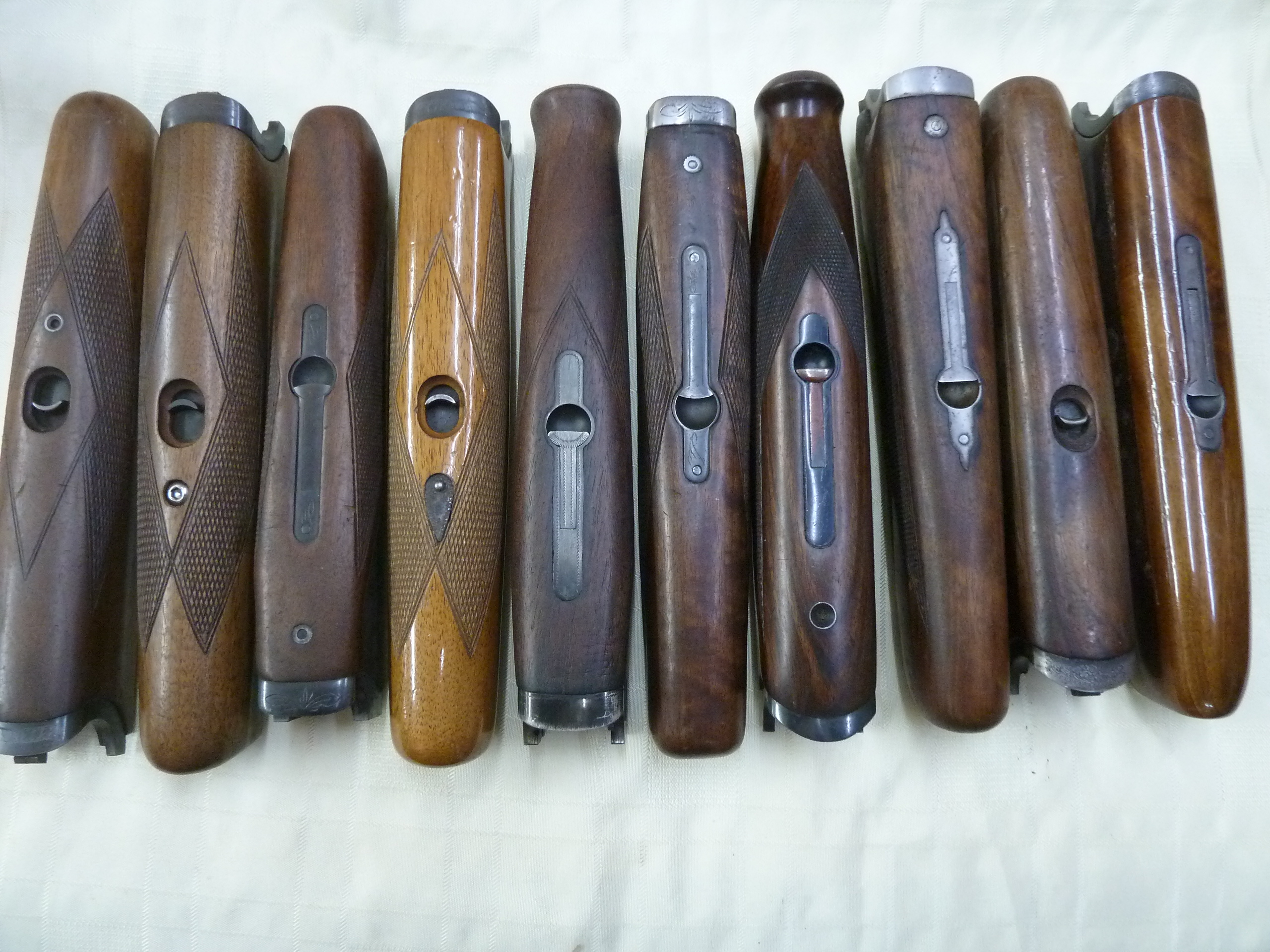 Assorted over and under shotgun forends