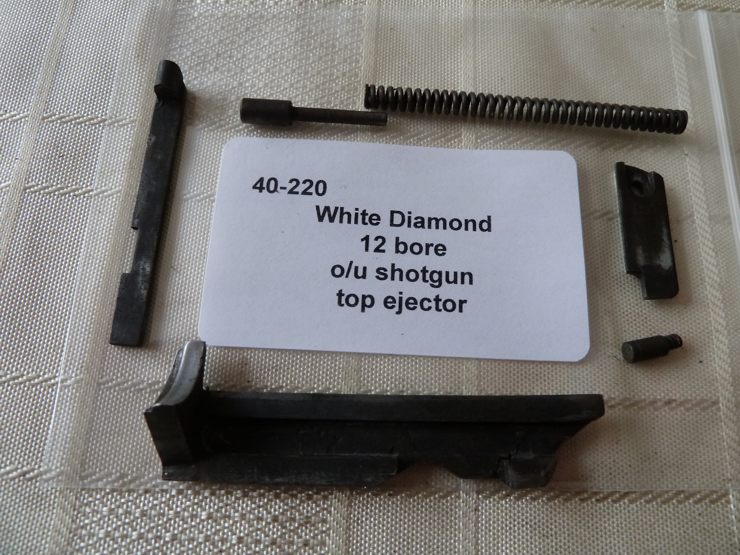 White Diamond 12 gauge shotgun top ejector