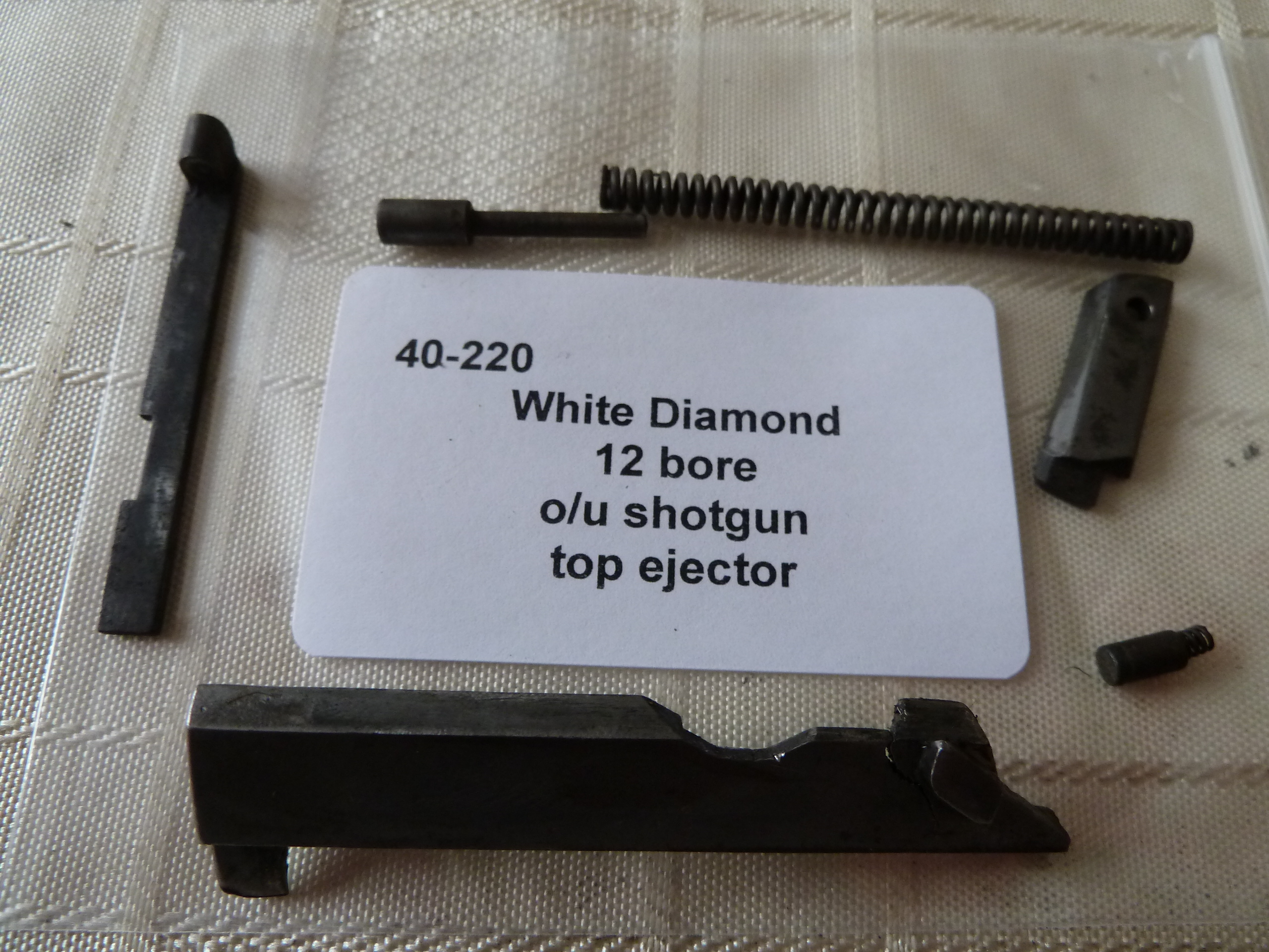 White Diamond 12 gauge shotgun top ejector