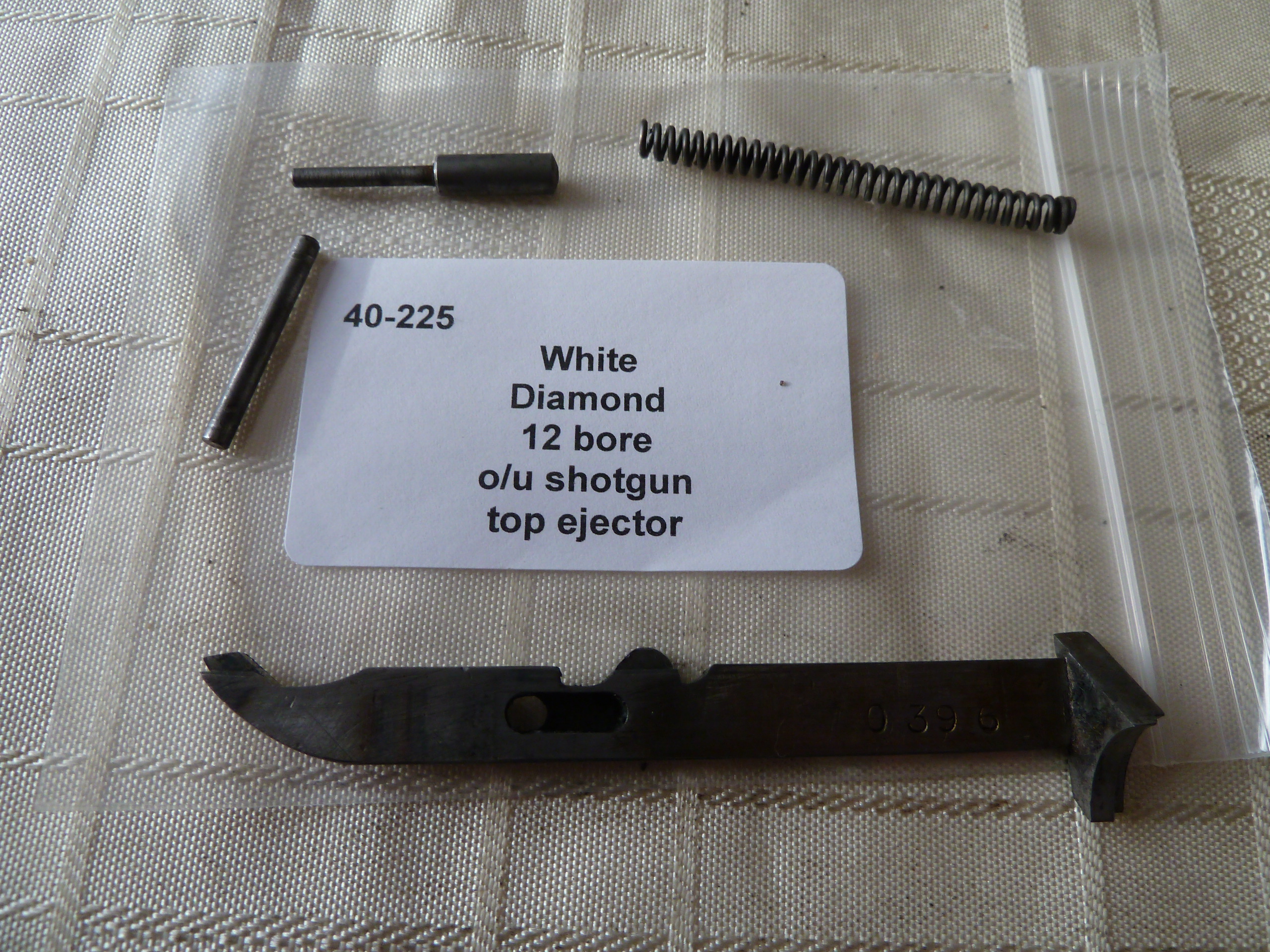 White Diamond shotgun top ejector