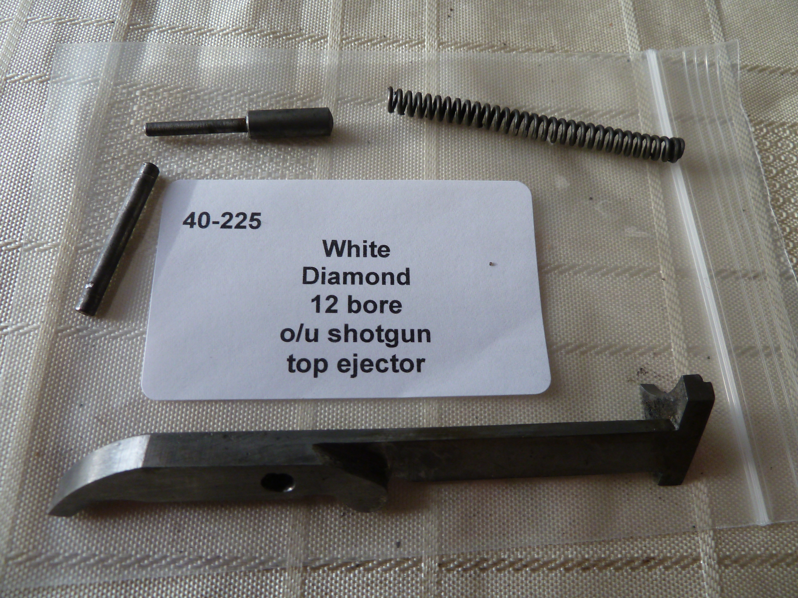 White Diamond shotgun top ejector