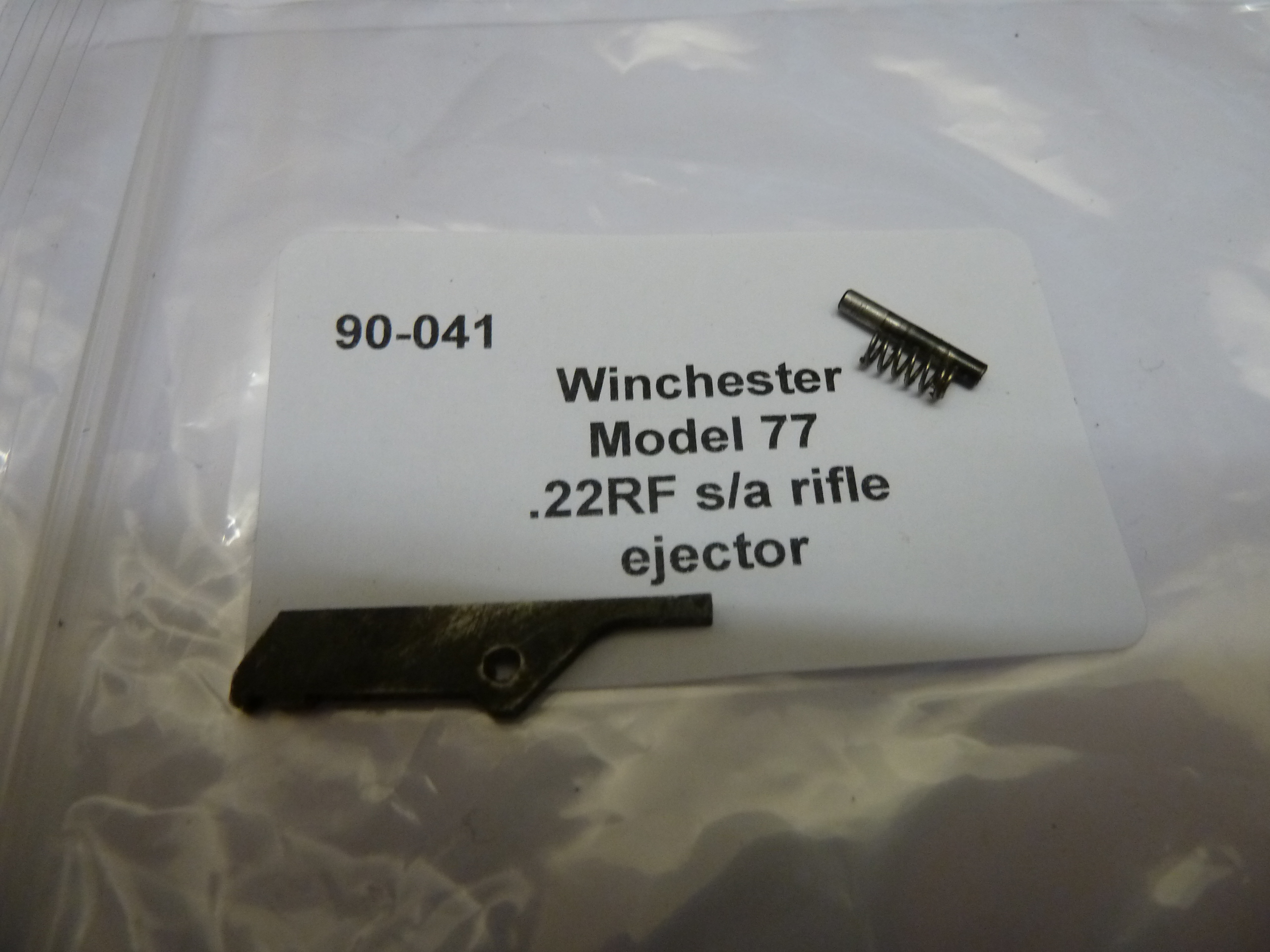 Winchester 77 rifle ejector