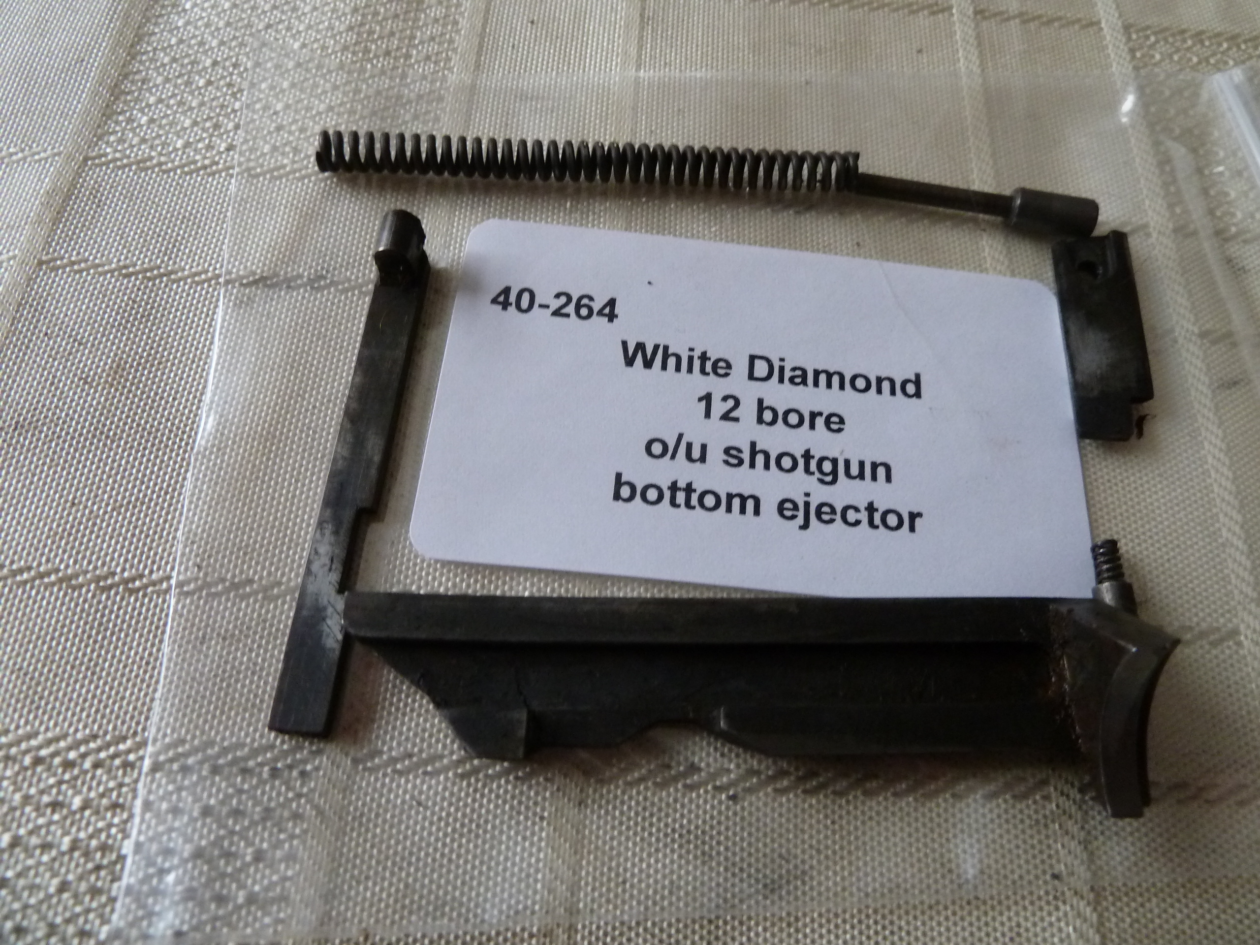 White Diamond shotgun bottom ejector