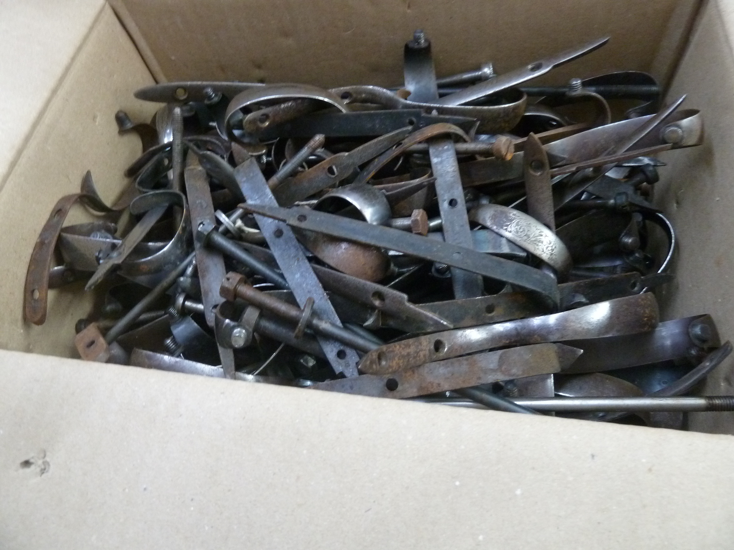 Assorted trigger guards and stock bolts